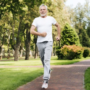full shot old man running outdoors
